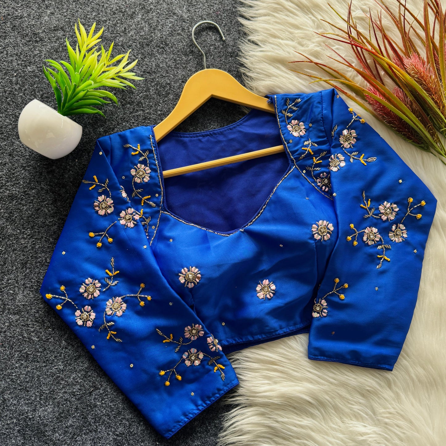 A beauty of golden handwork work with colourful thread and sequins all over ready made blouse