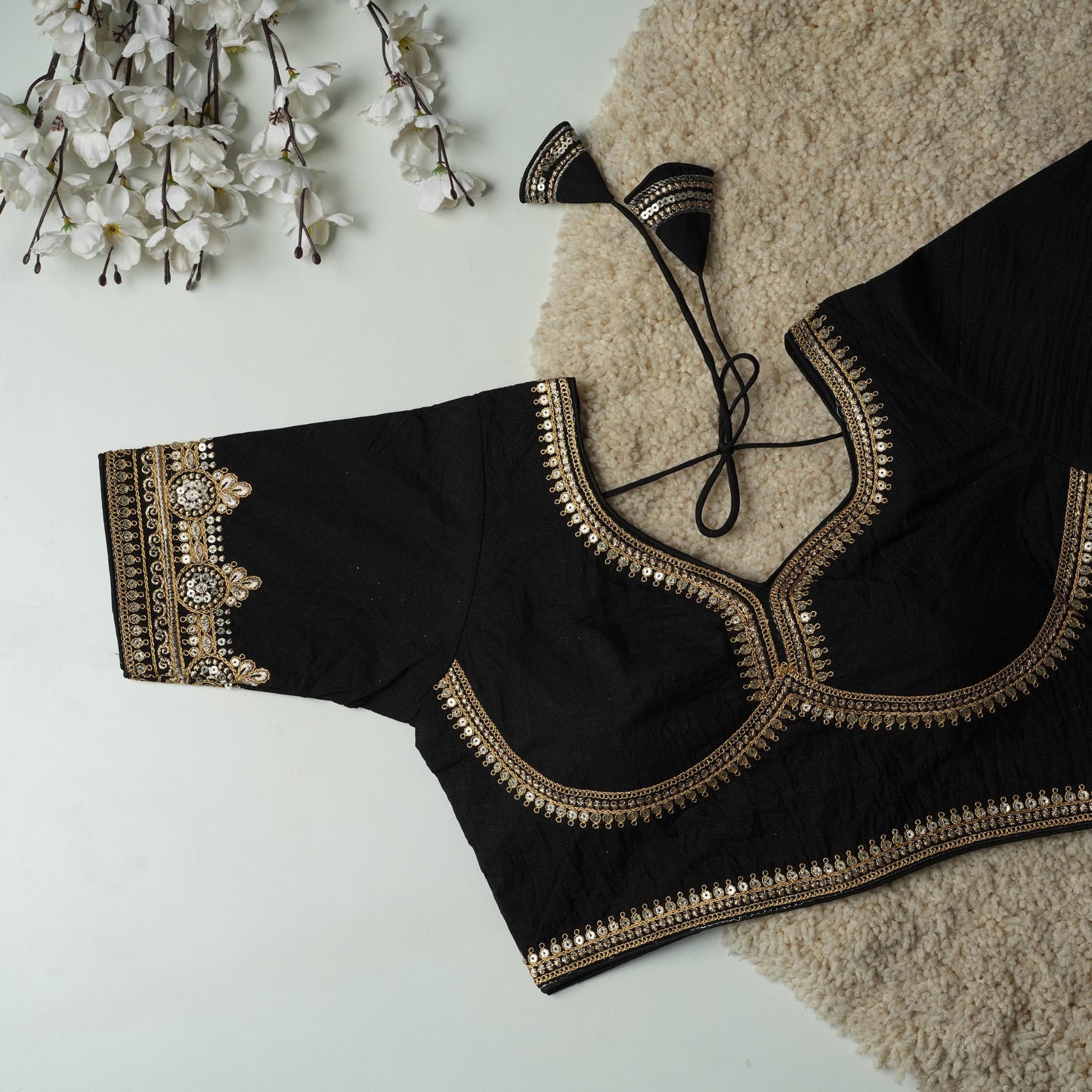 A beauty of golden embroidery work ready made blouse