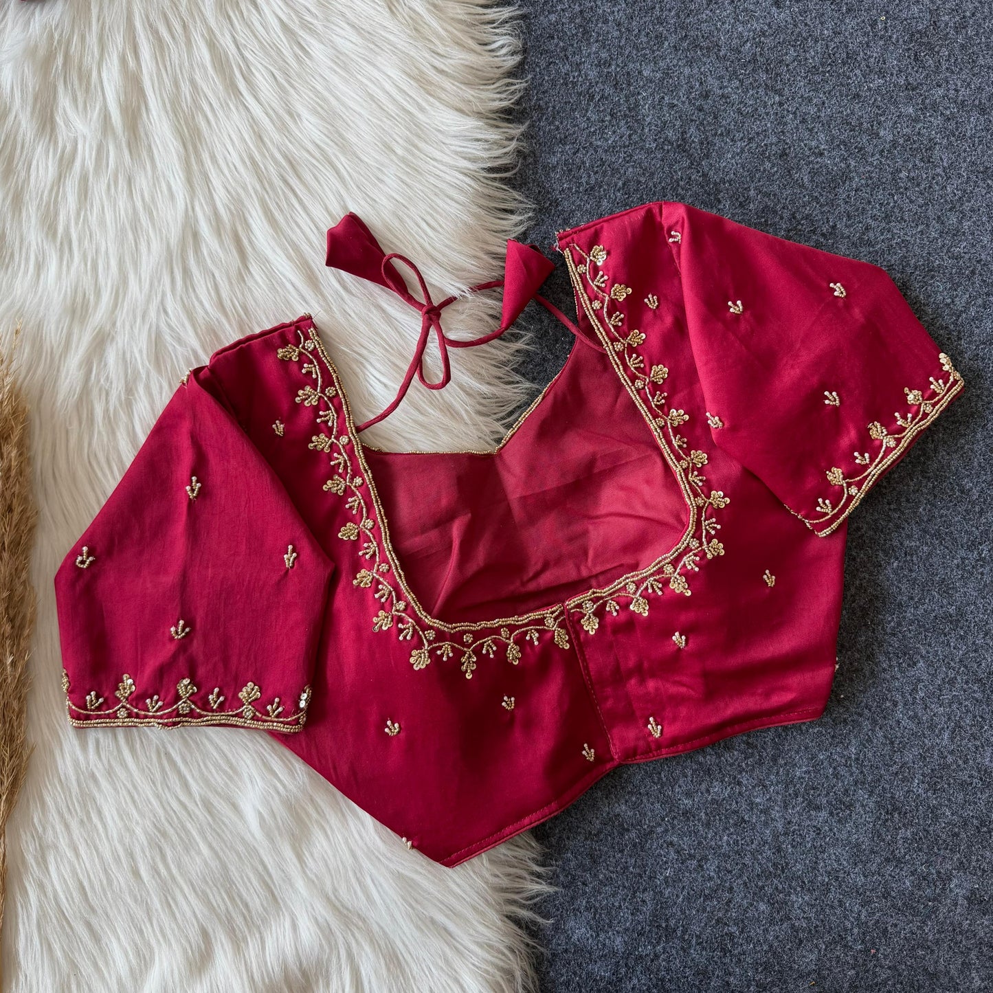 Beautiful handcrafted work in sleeves and back all over ready made blouse