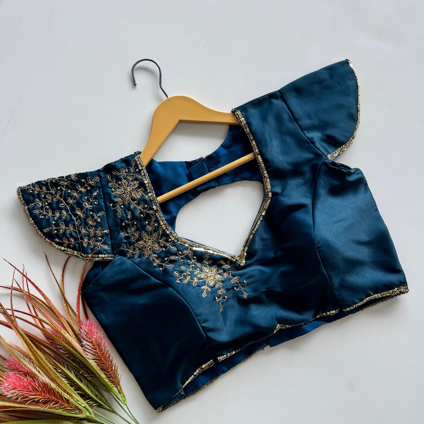 A beauty of golden handwork work all over ready made blouse