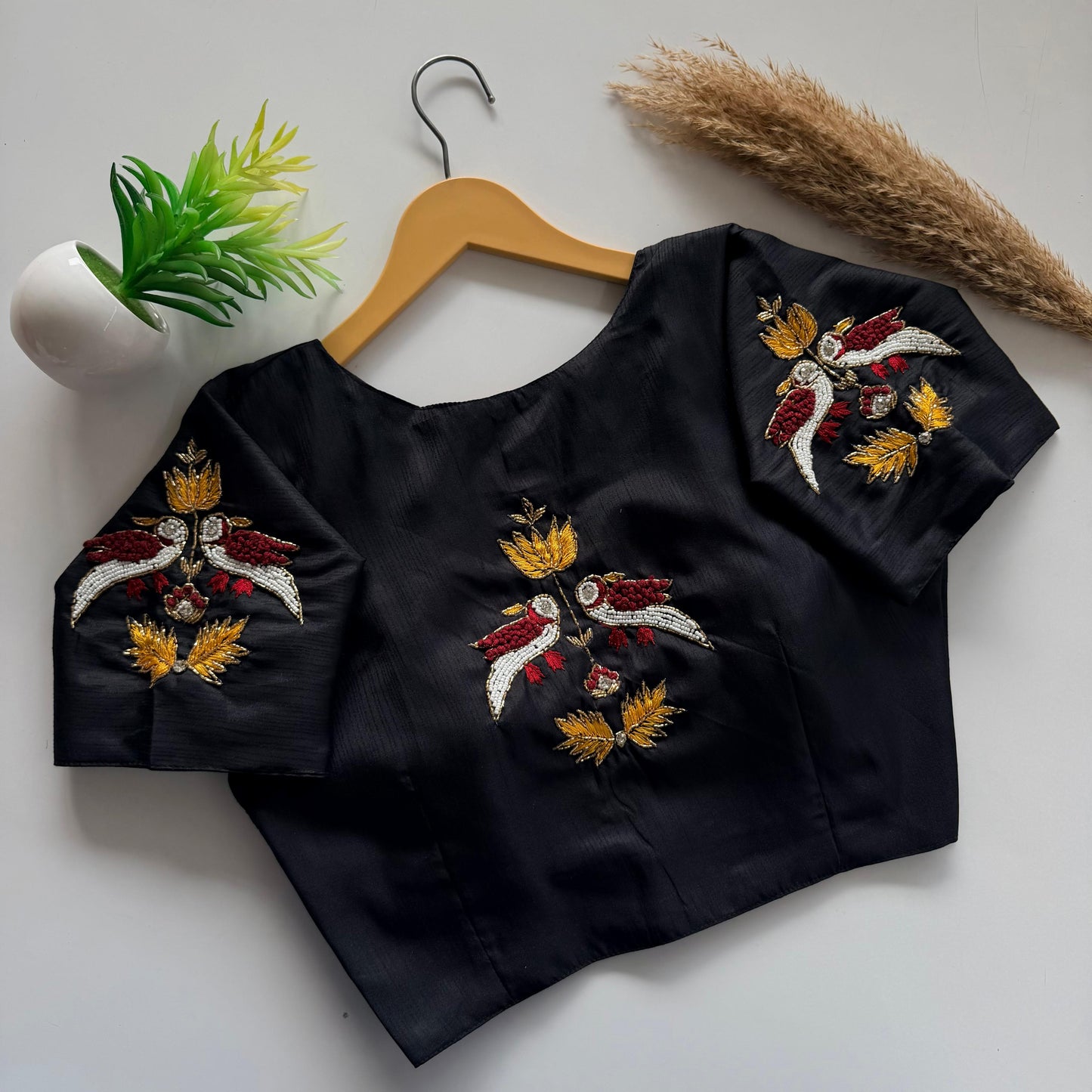 Beautiful handcrafted work in sleeves and back ready made blouse