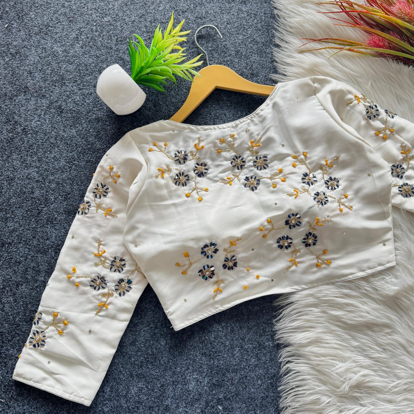 A beauty of golden handwork work with colourful thread and sequins all over ready made blouse