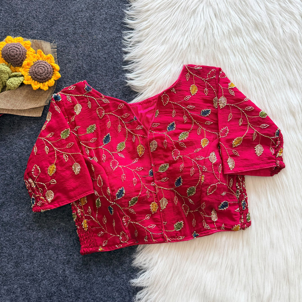 Beautiful embroidery work with elastic attach for better fitting ready made blouse