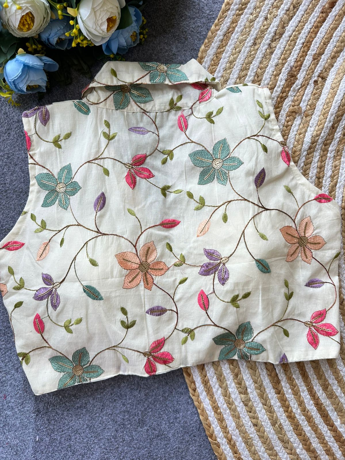 Beautiful cotton with embroidered sleeveless ready made blouse
