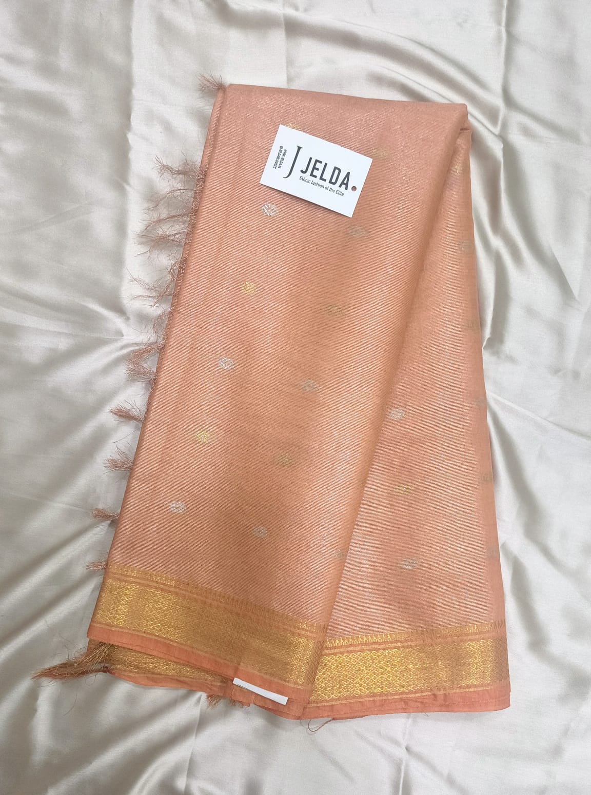 Beautiful tissue putta work saree