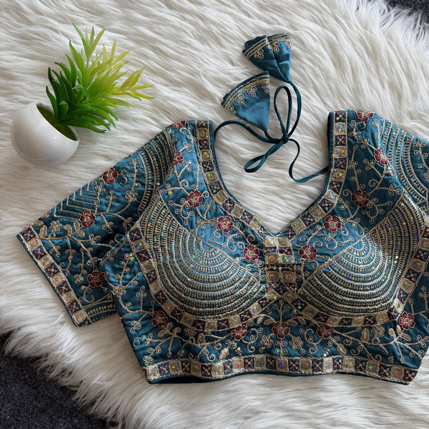 A beautiful work with sequins all over ready made blouse