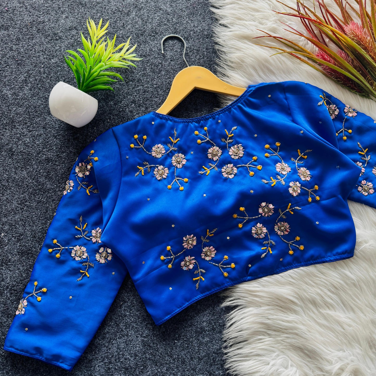 A beauty of golden handwork work with colourful thread and sequins all over ready made blouse