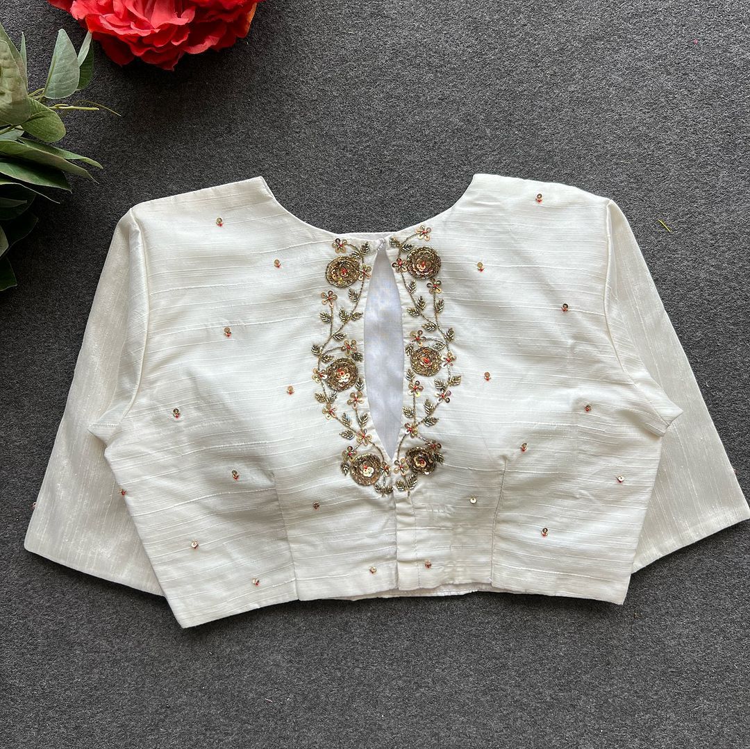 A beauty of golden handwork all over ready made blouse
