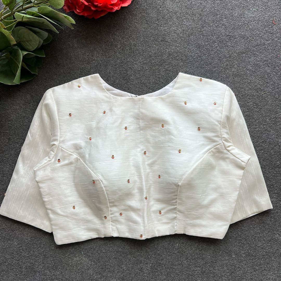 A beauty of golden handwork all over ready made blouse