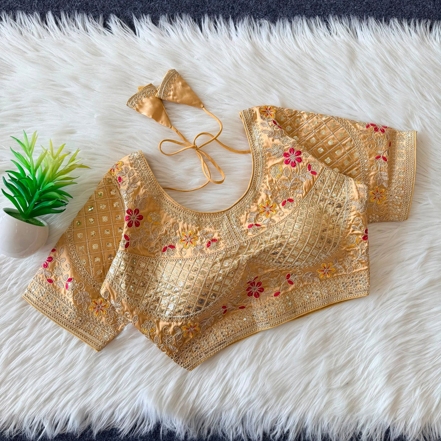 A beautiful  work with  sequence all over ready made blouse