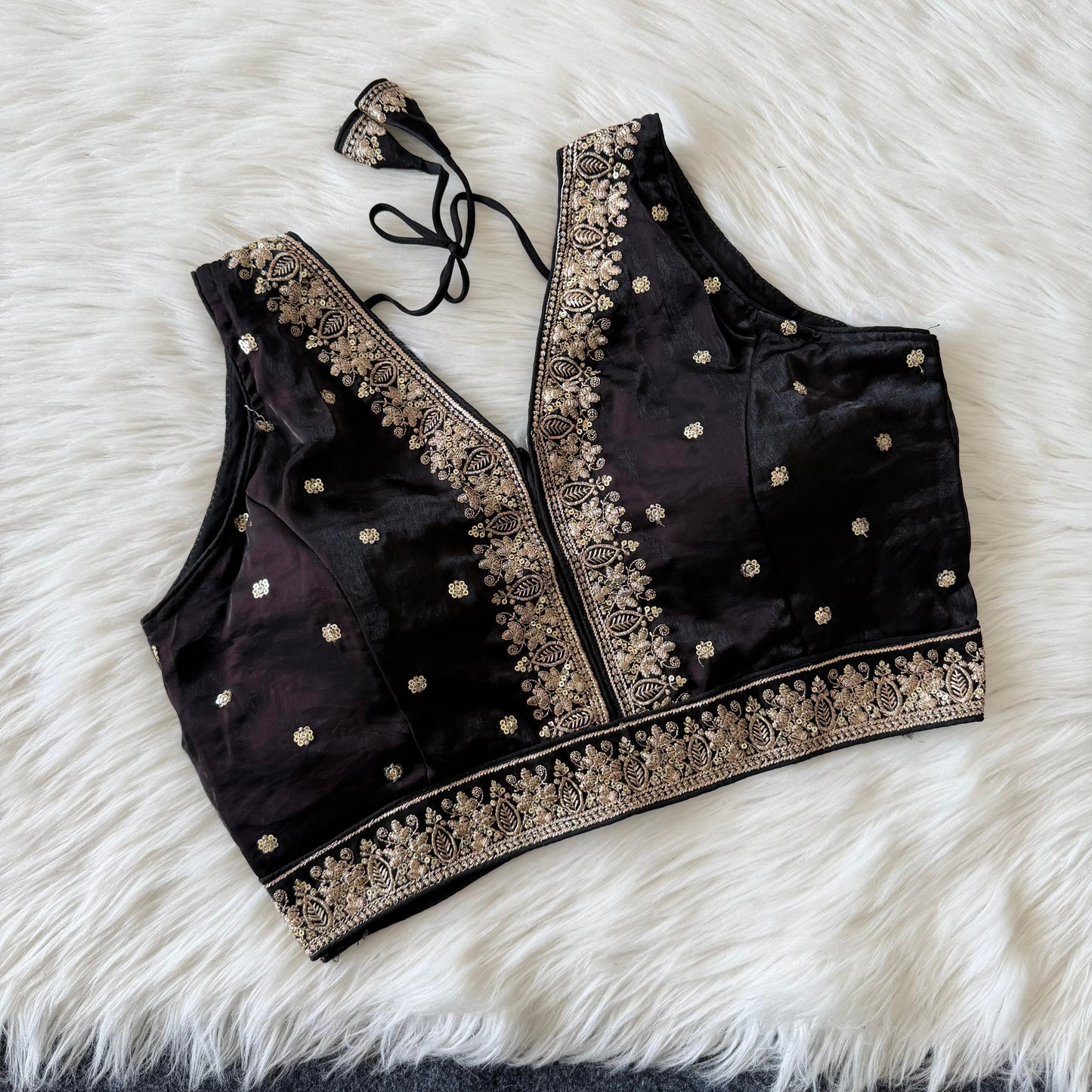 A beautiful work with sequins all over ready made blouse