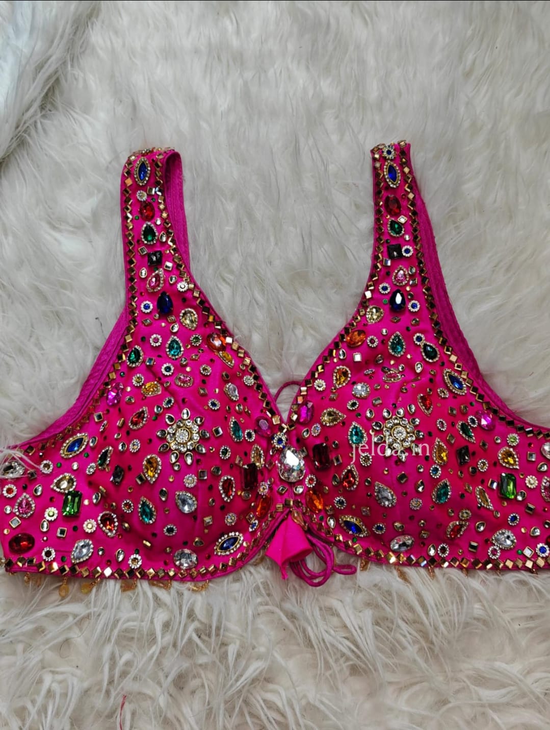 Exclusive jewellary stone work sleeveless custom made blouse