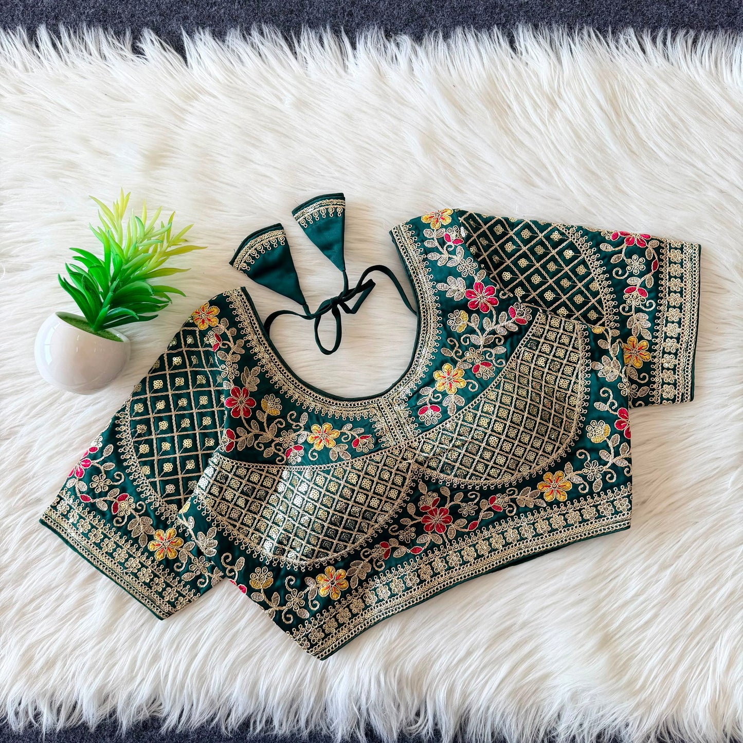 A beautiful  work with  sequence all over ready made blouse