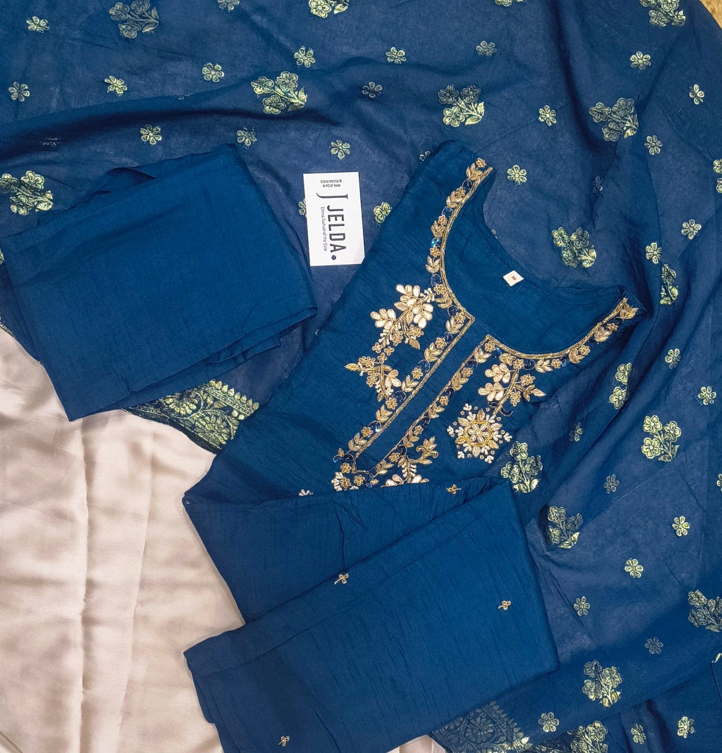 Exclusive silk with golden zari work salwar suit