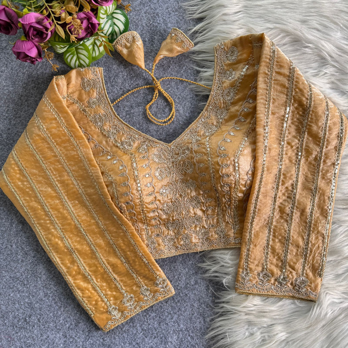 A beauty of golden embroidery work ready made blouse