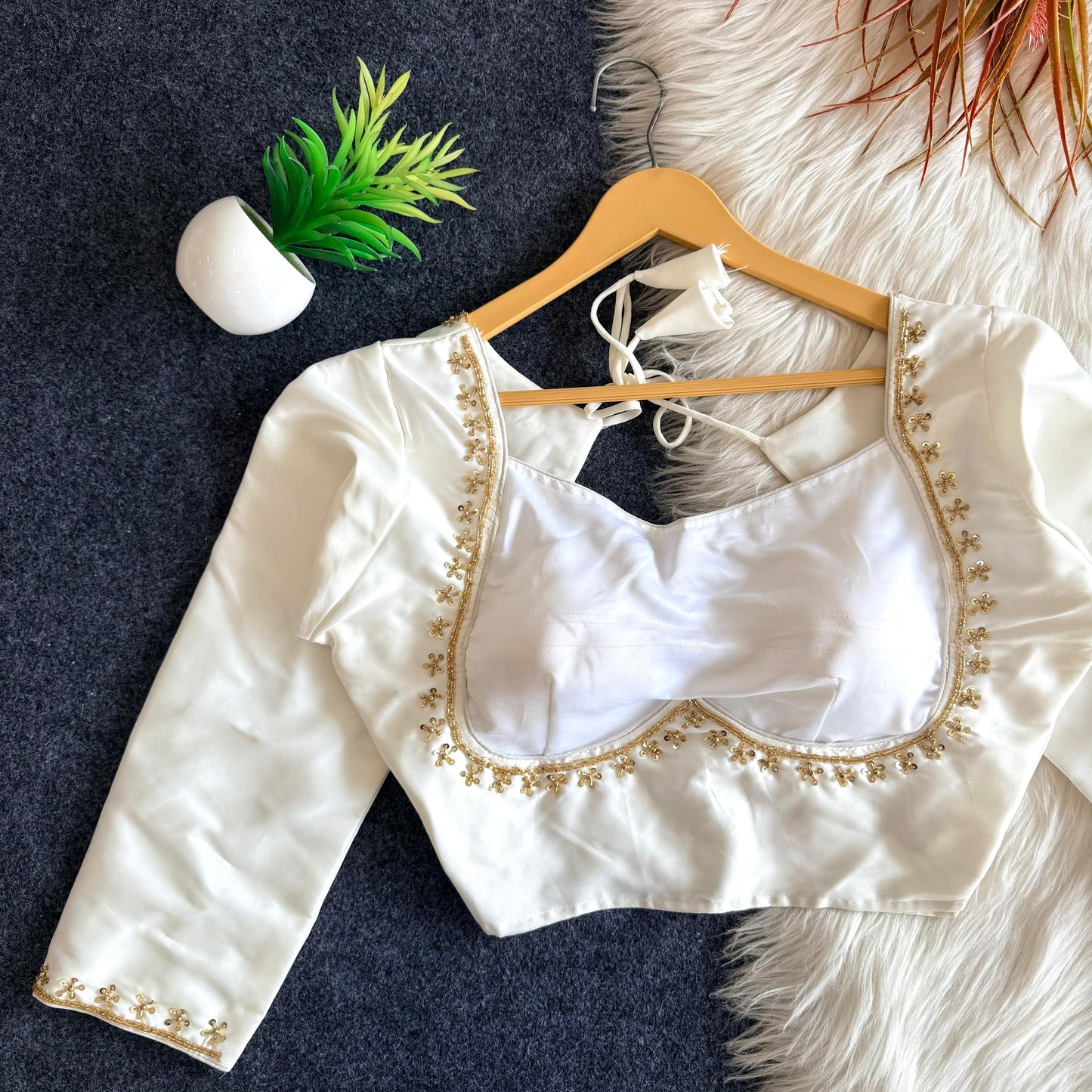 A beauty of golden handwork and sequins all over ready made blouse