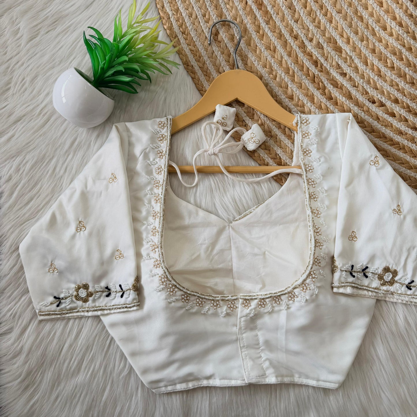 Beautiful handcrafted work in sleeves and back all over ready made blouse