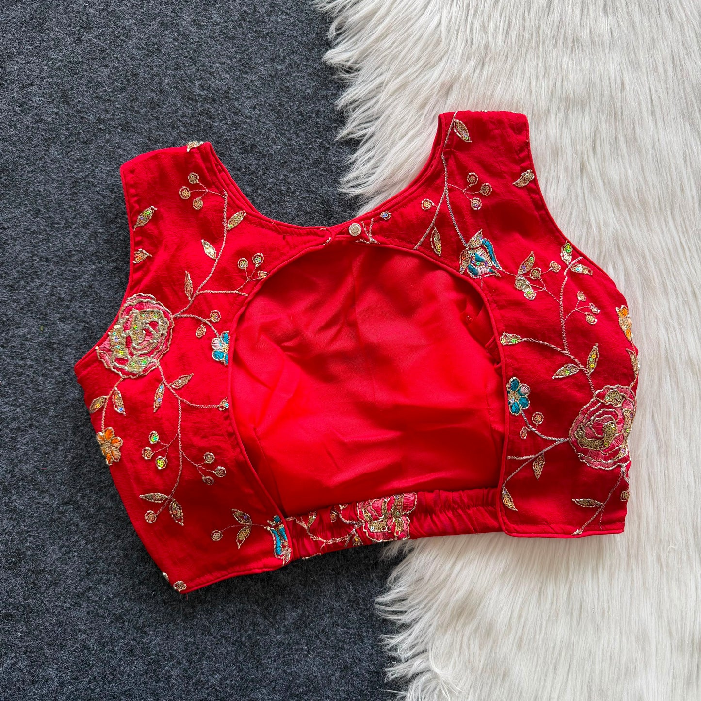 Beautiful embroidery work with elastic attach for better fitting ready made blouse