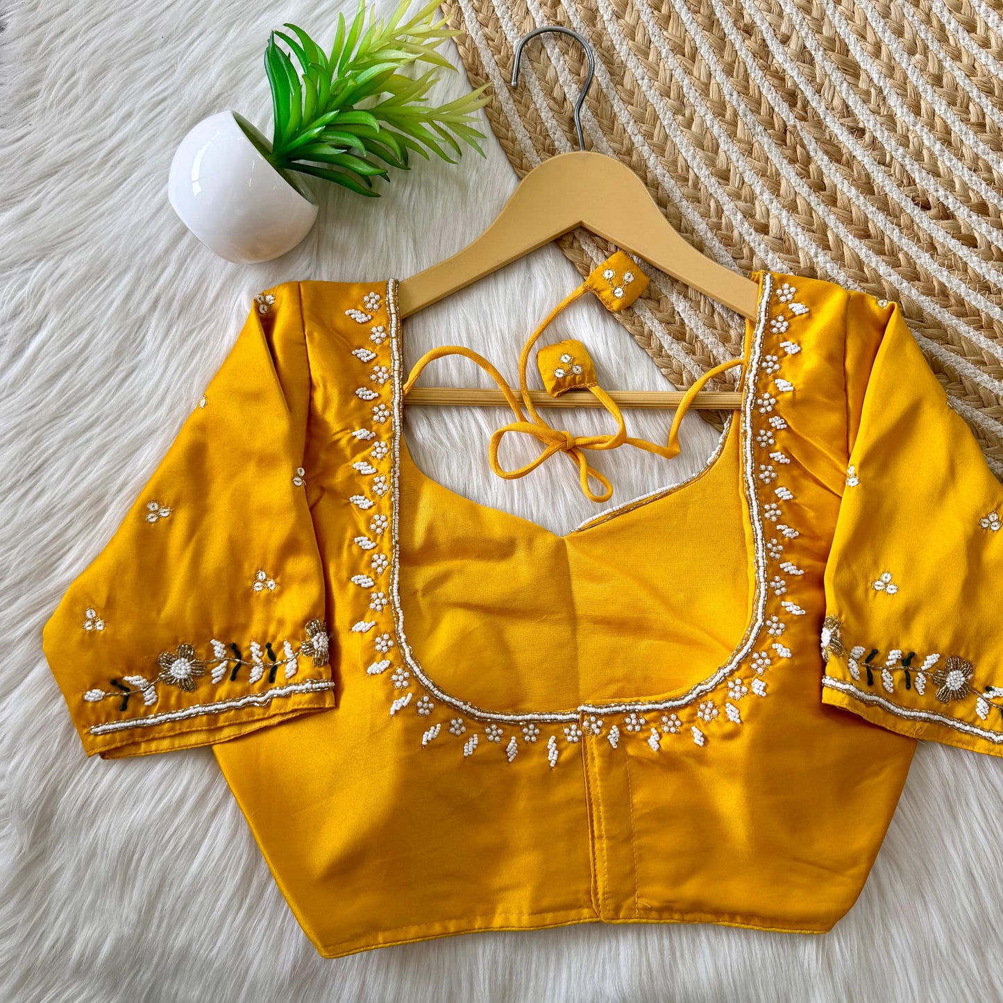 Beautiful handcrafted work in sleeves and back all over ready made blouse