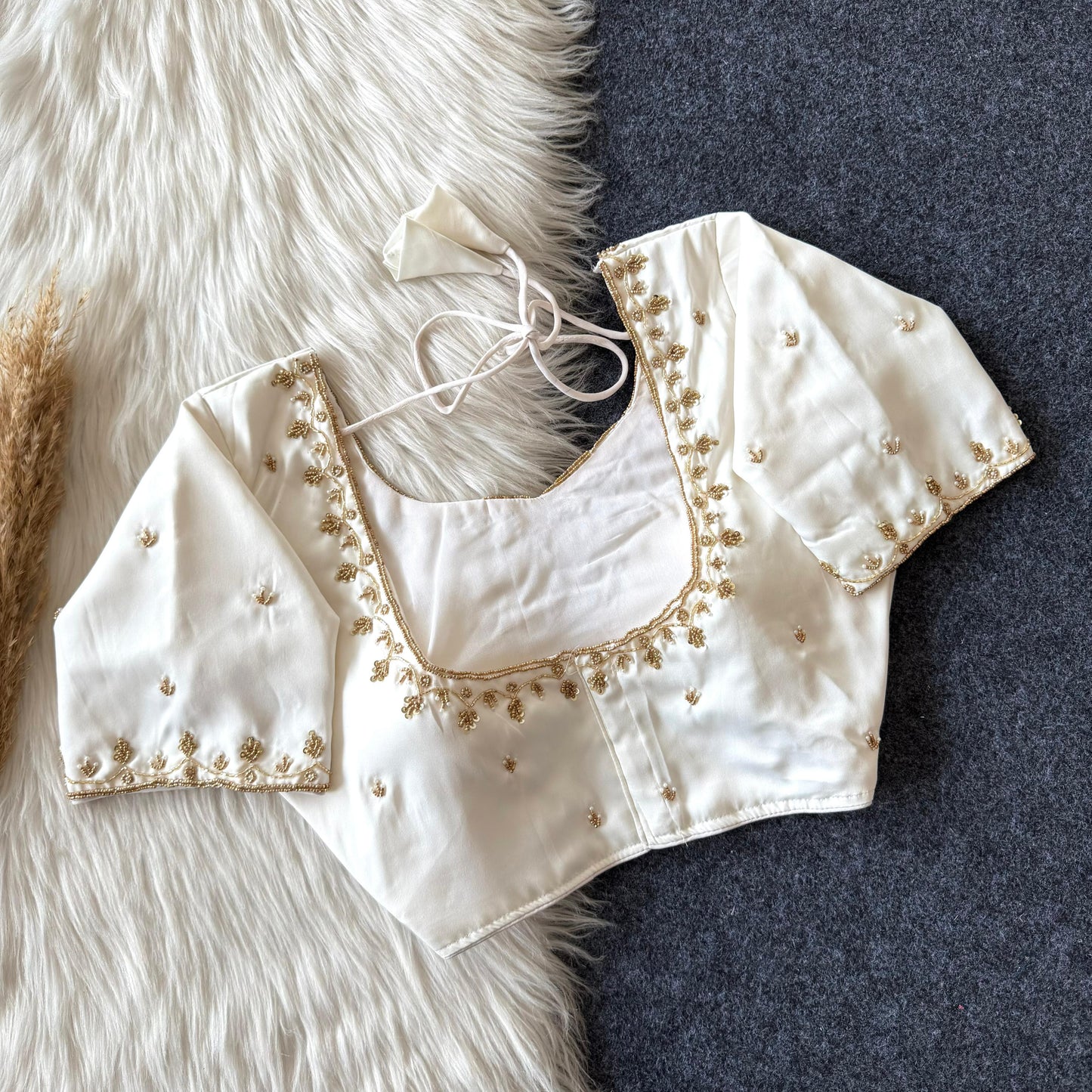 Beautiful handcrafted work in sleeves and back all over ready made blouse
