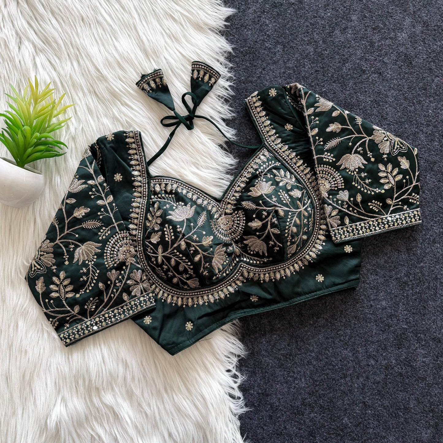 A beautiful  work with  sequence all over ready made blouse