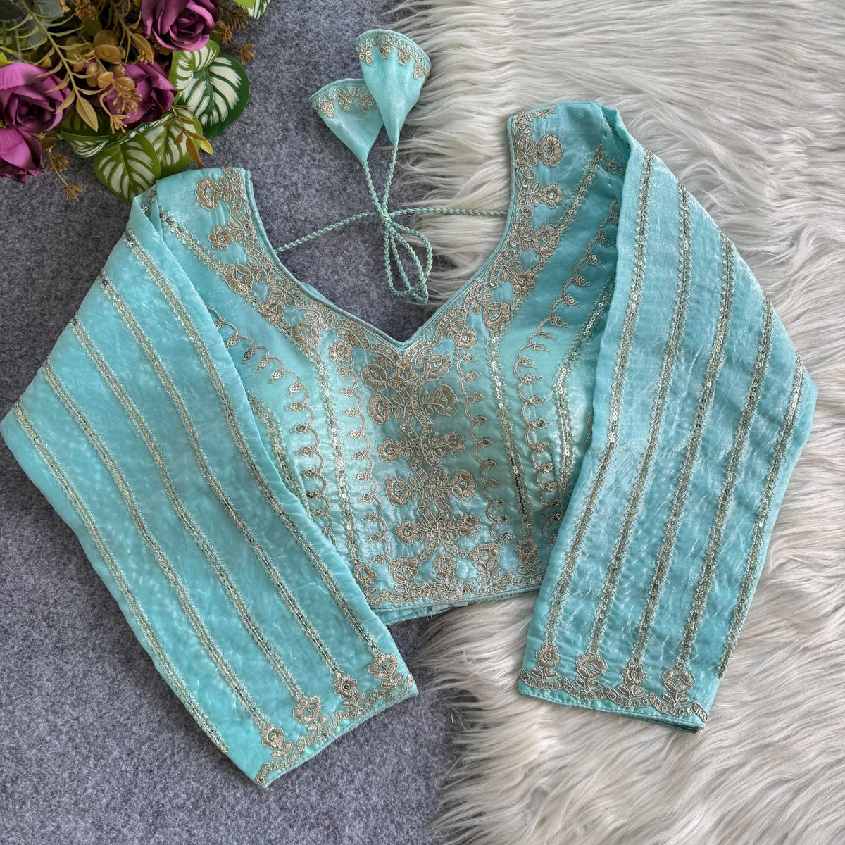 A beauty of golden embroidery work ready made blouse