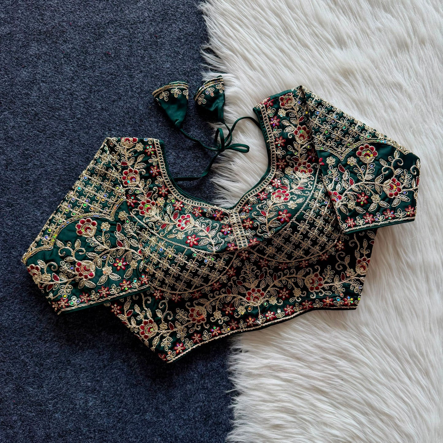 A beautiful  work with  sequins all over ready made blouse