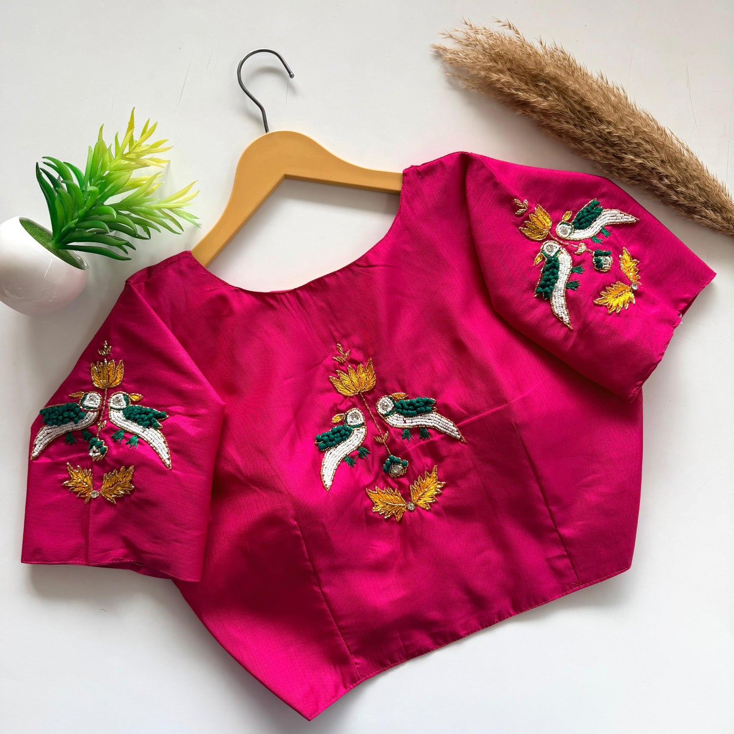 Beautiful handcrafted work in sleeves and back ready made blouse