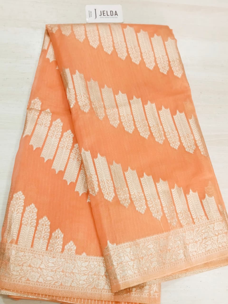 Silver putta work with border saree