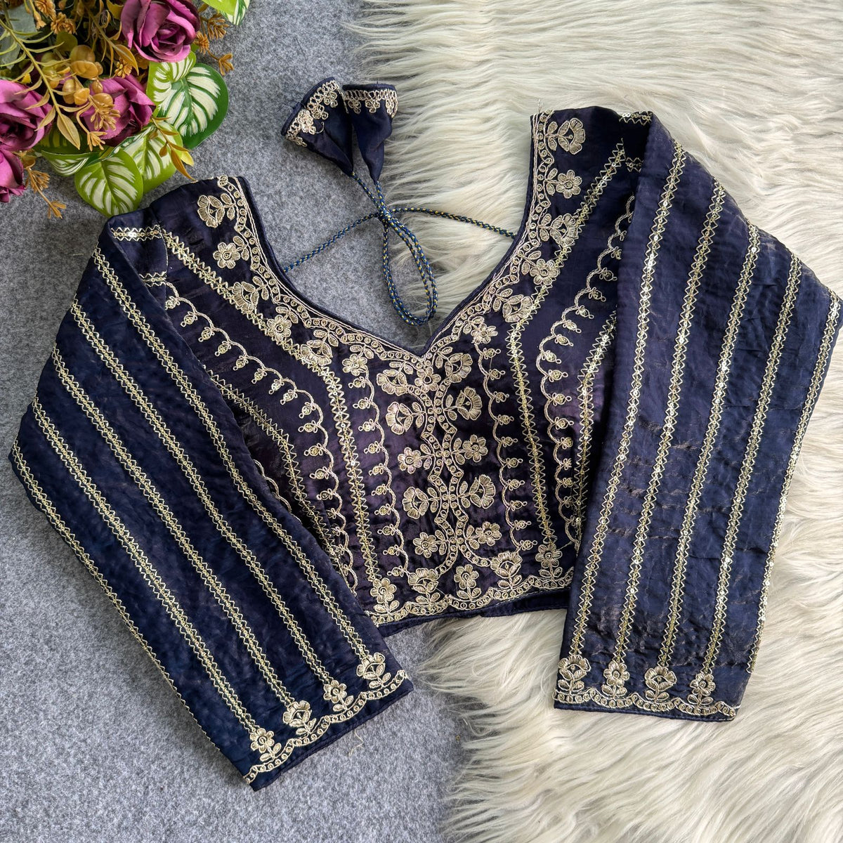 A beauty of golden embroidery work ready made blouse