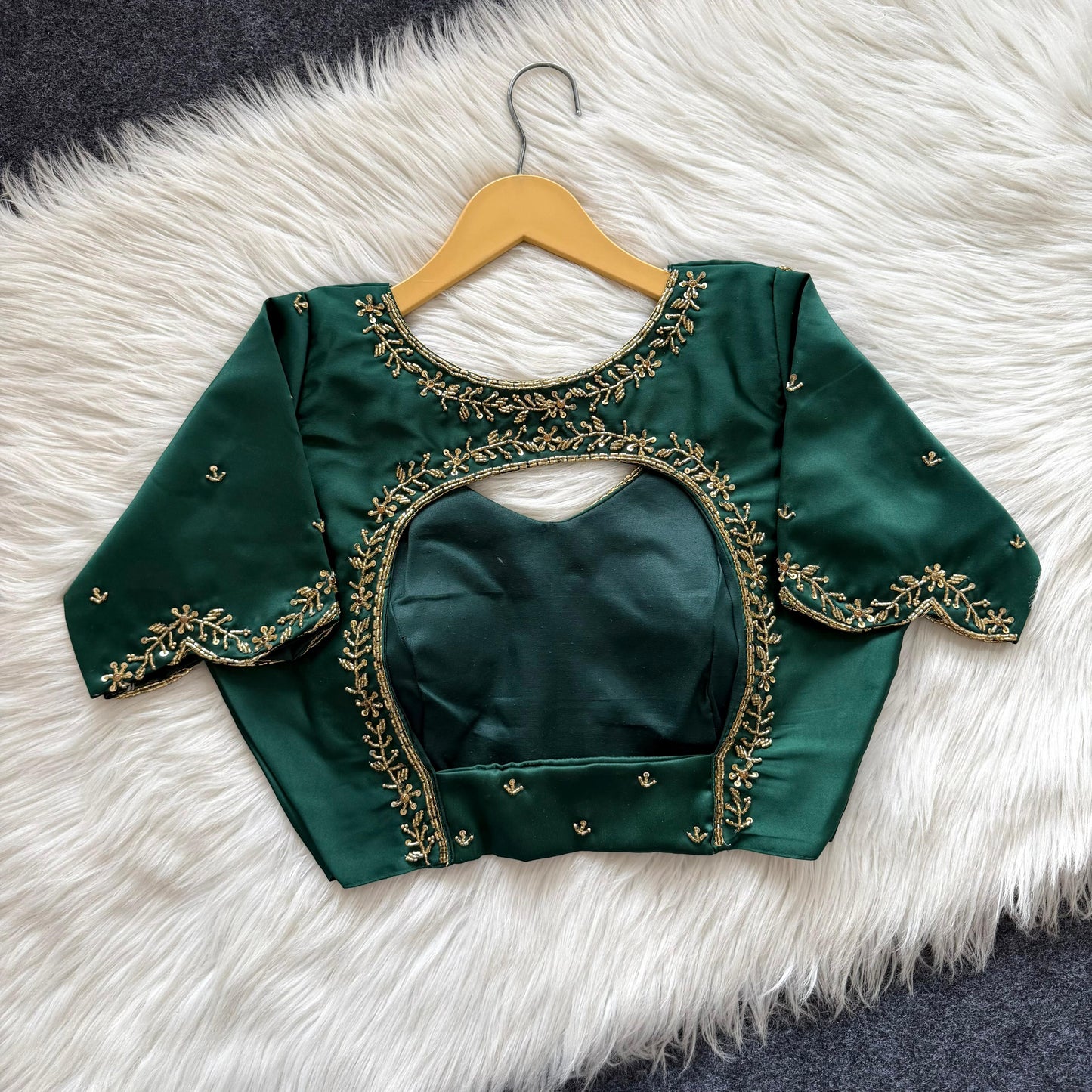 Beautiful handcrafted work in sleeves and back all over ready made blouse