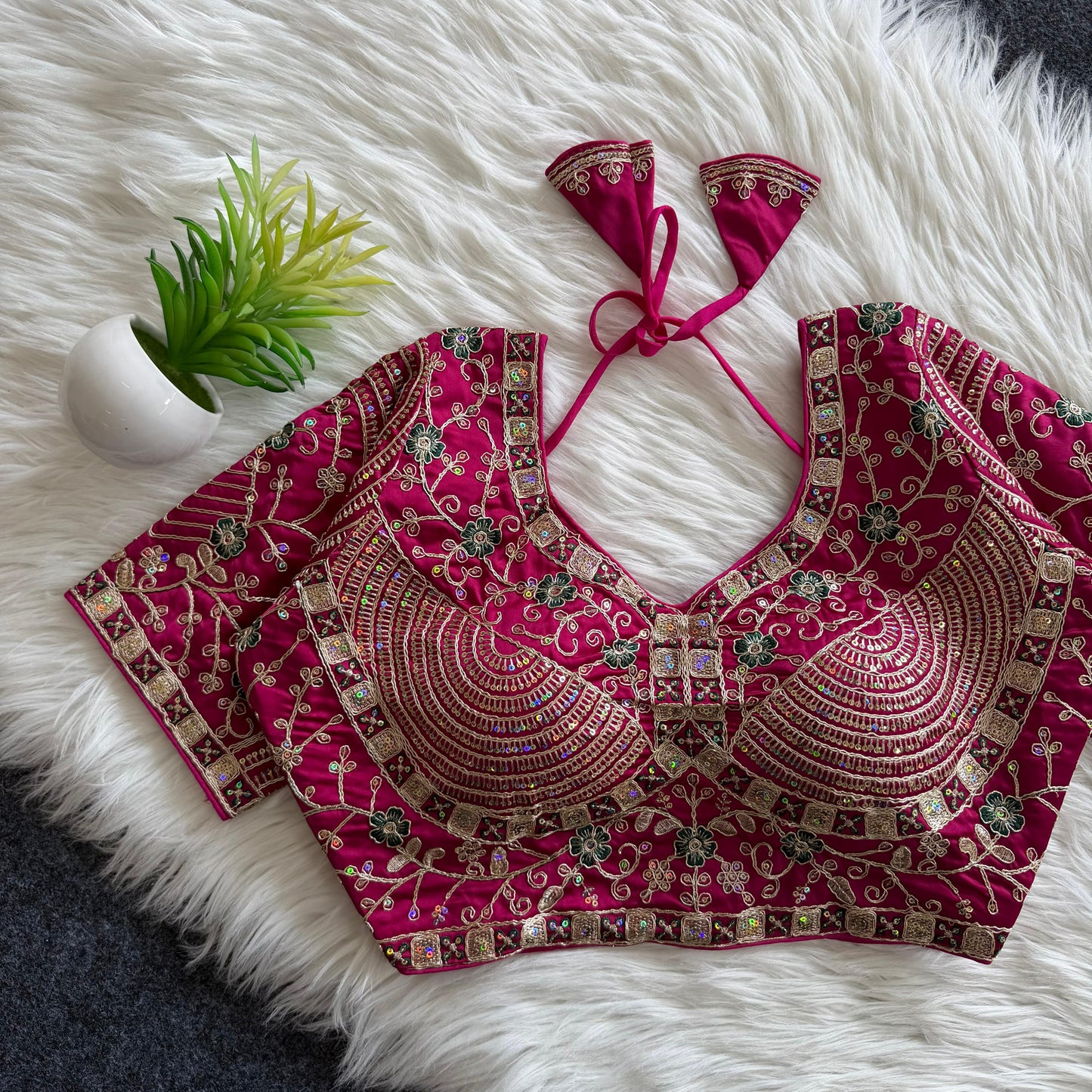 A beautiful work with sequins all over ready made blouse