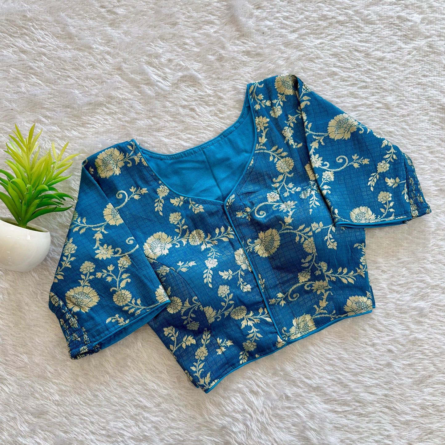 A beauty of weaving work all over with stretchable technology inside ready made blouse