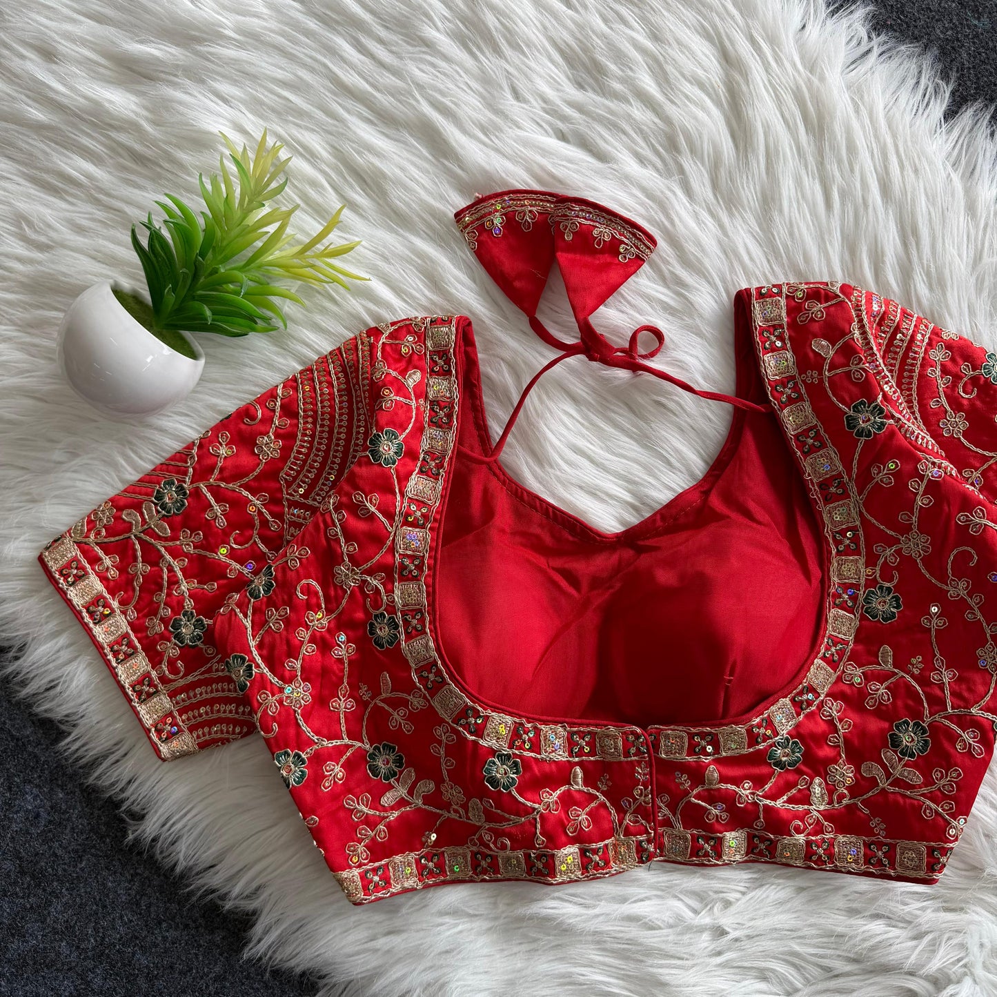 A beautiful work with sequins all over ready made blouse