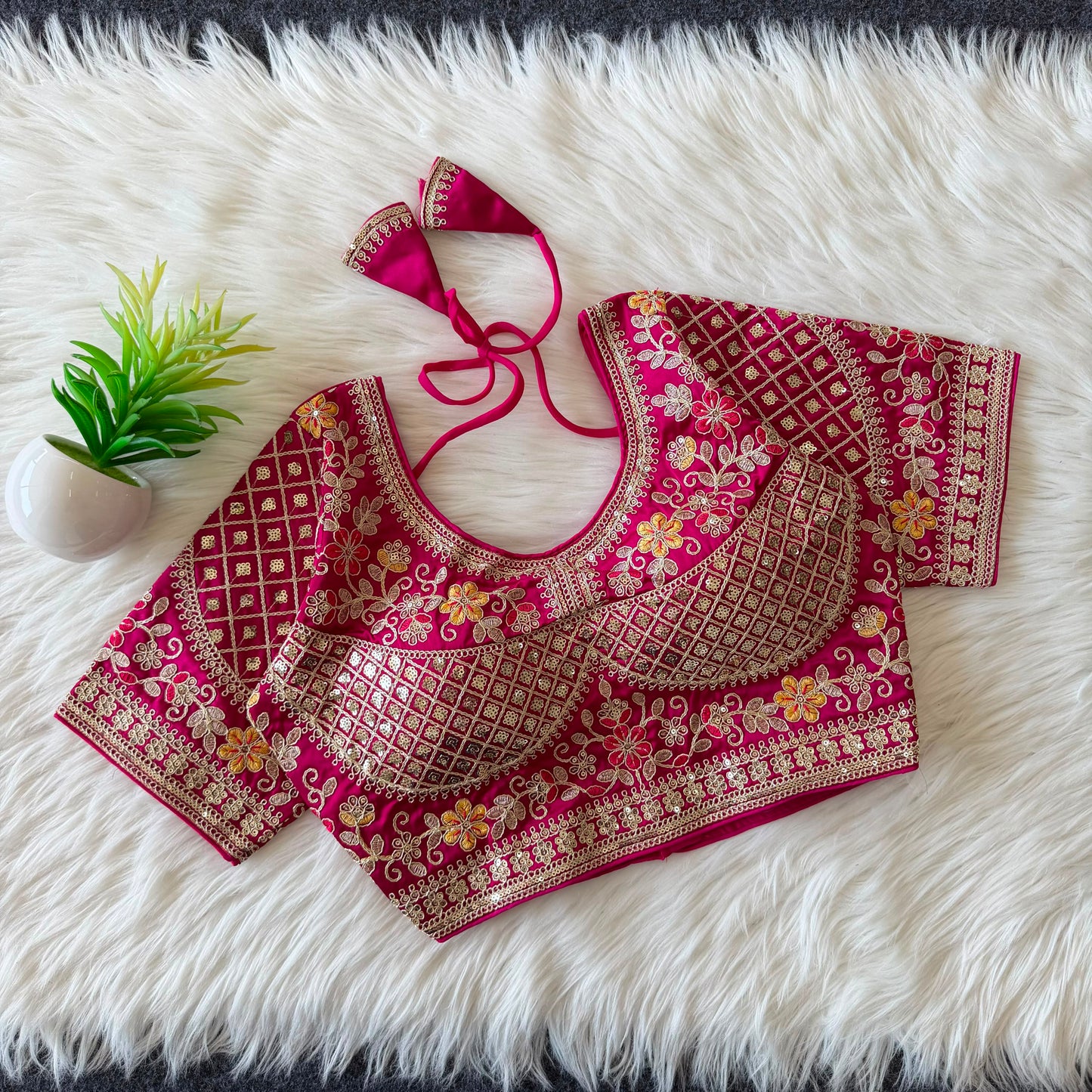 A beautiful  work with  sequence all over ready made blouse
