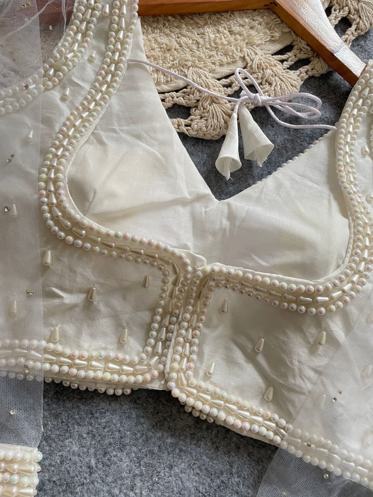 Presenting beautiful handcrafted pearl work ready made blouse