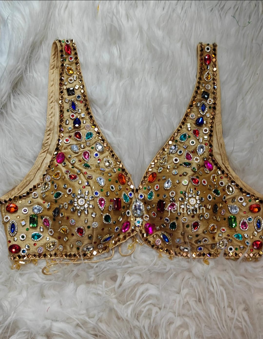 Exclusive jewellary stone work sleeveless custom made blouse