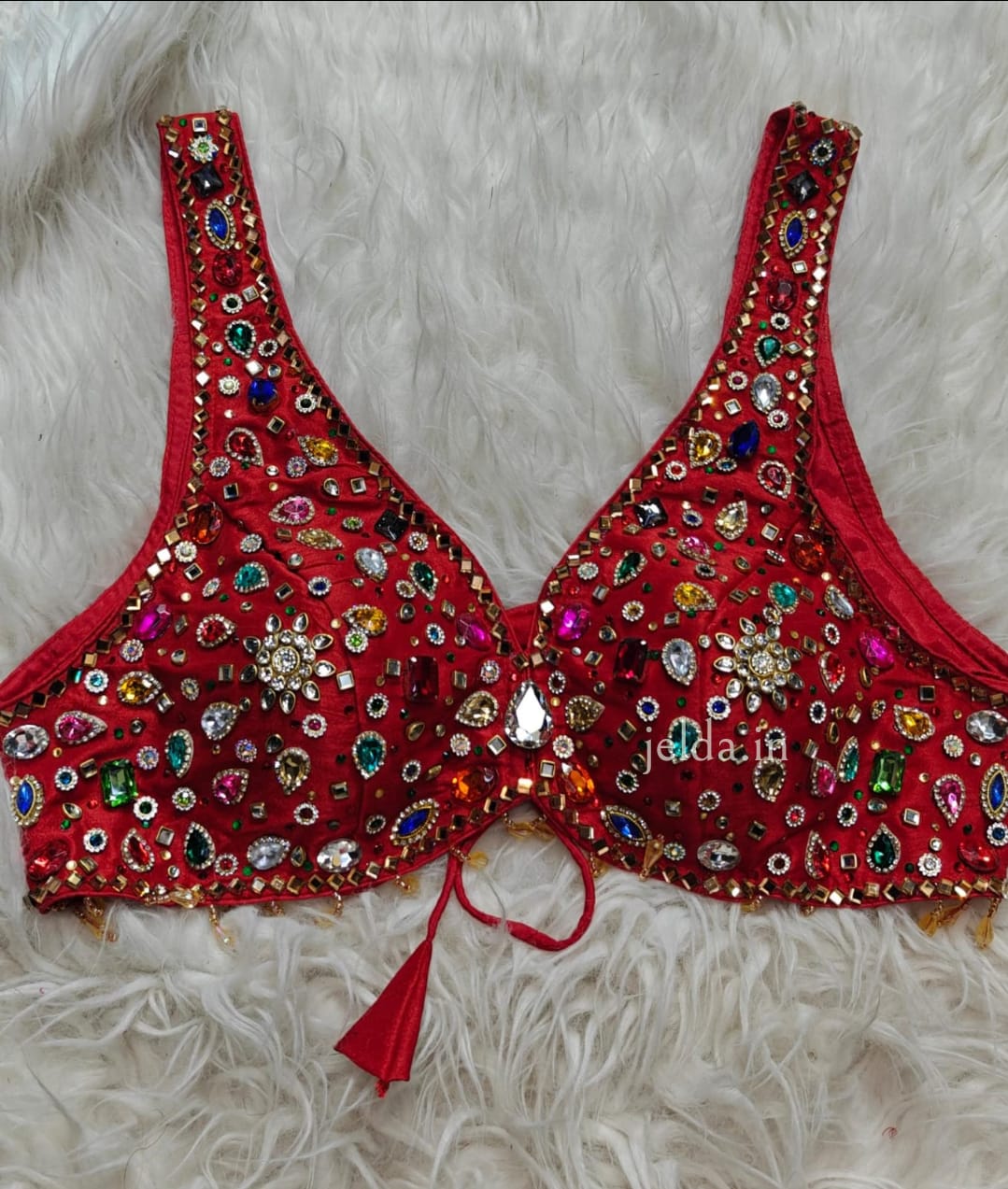 Exclusive jewellary stone work sleeveless custom made blouse