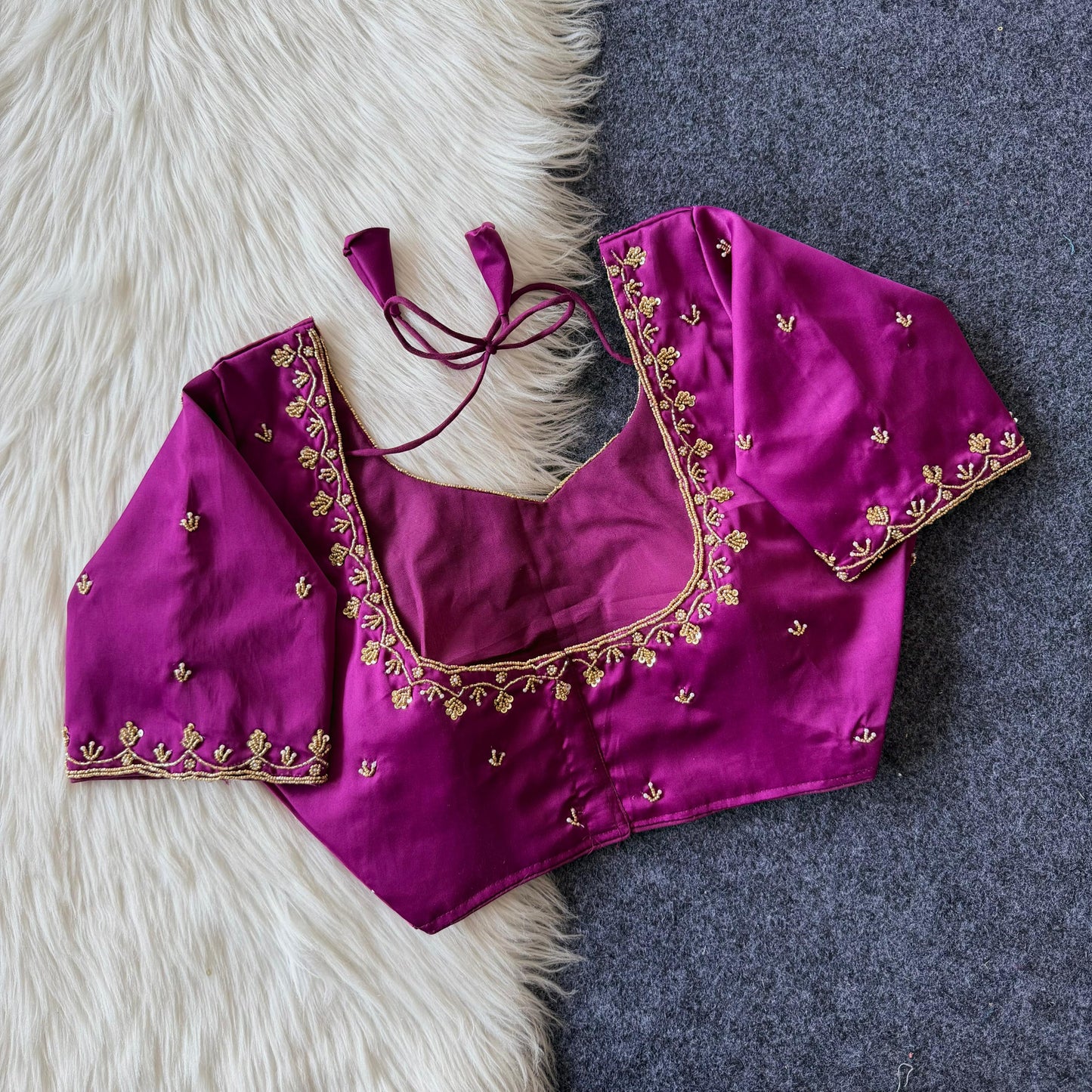 Beautiful handcrafted work in sleeves and back all over ready made blouse