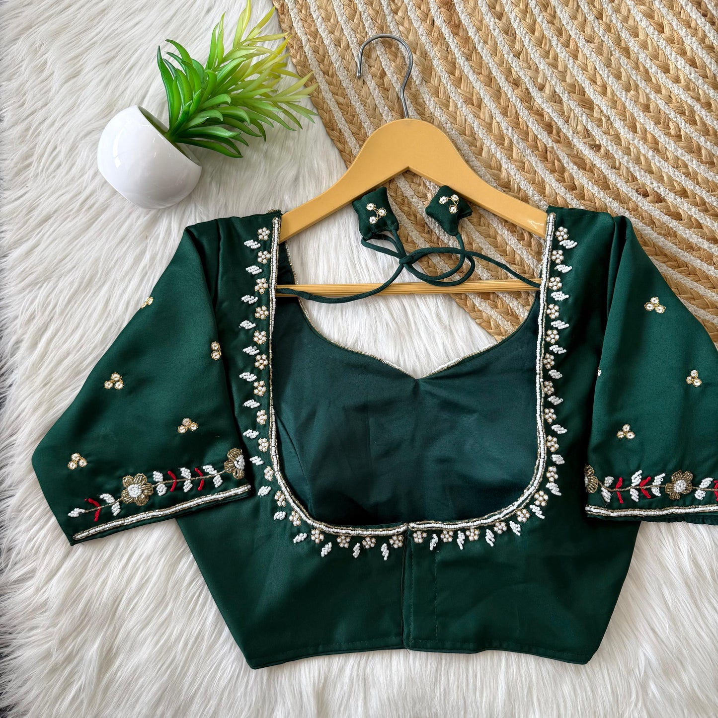 Beautiful handcrafted work in sleeves and back all over ready made blouse