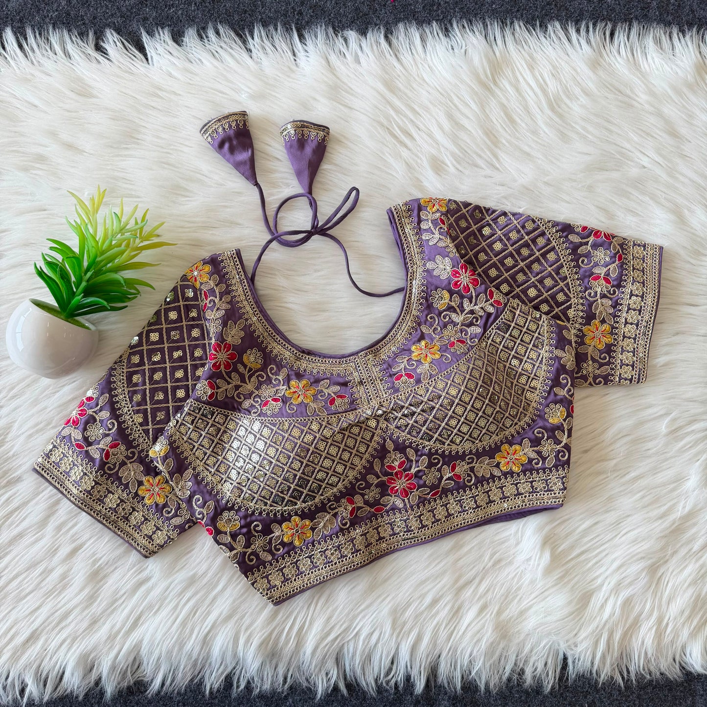 A beautiful  work with  sequence all over ready made blouse