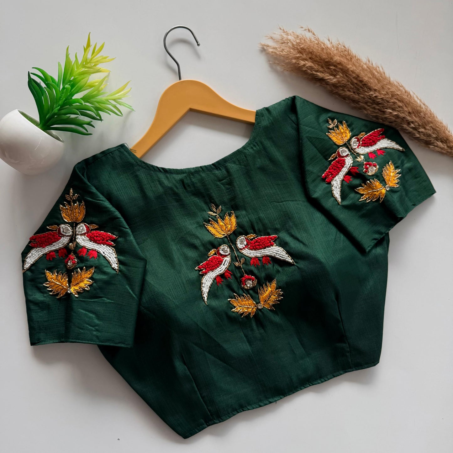 Beautiful handcrafted work in sleeves and back ready made blouse