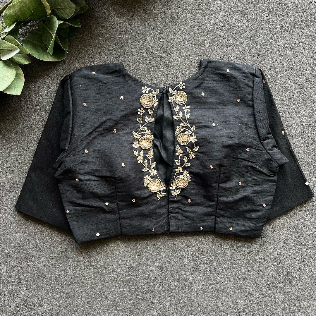 A beauty of golden handwork all over ready made blouse