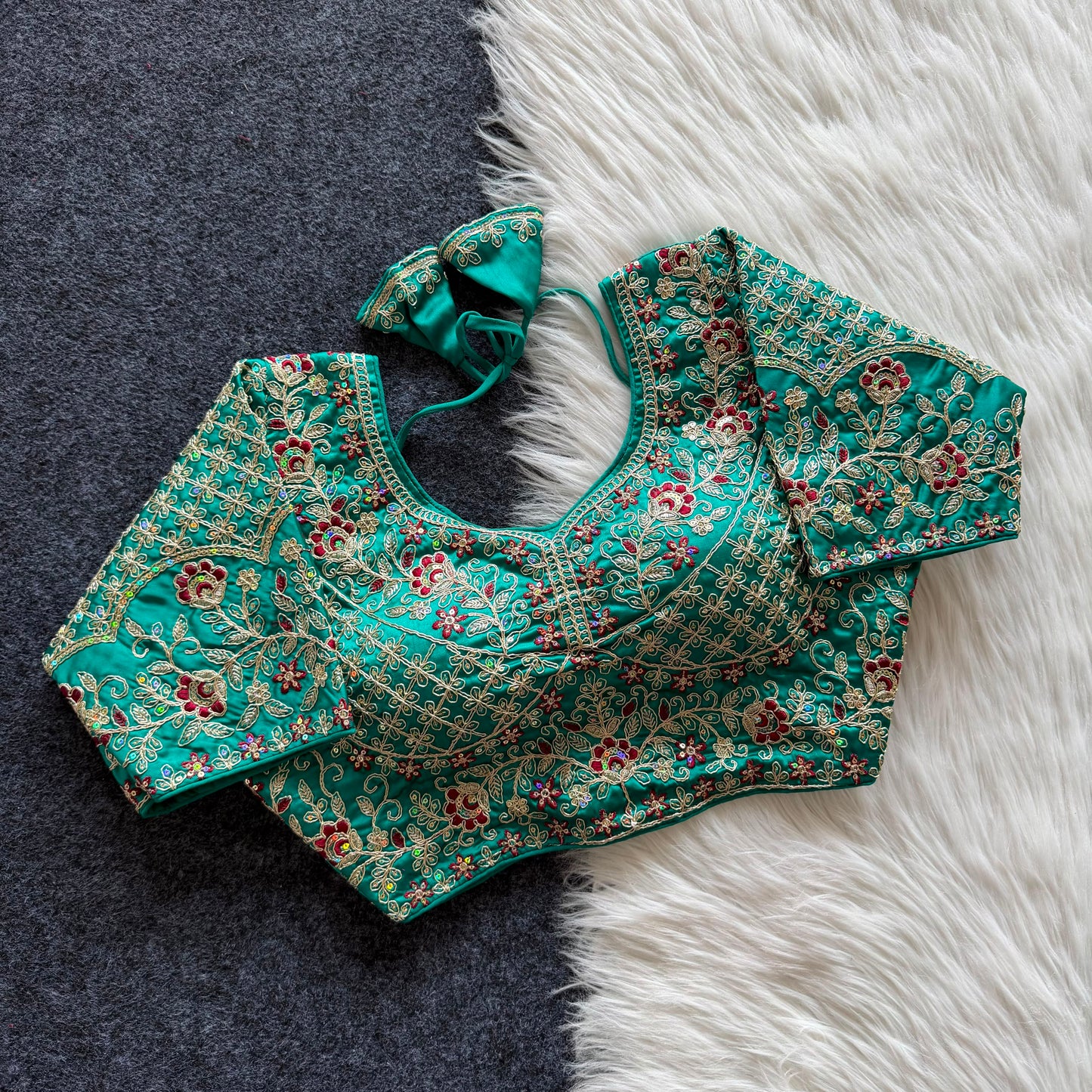 A beautiful  work with  sequins all over ready made blouse