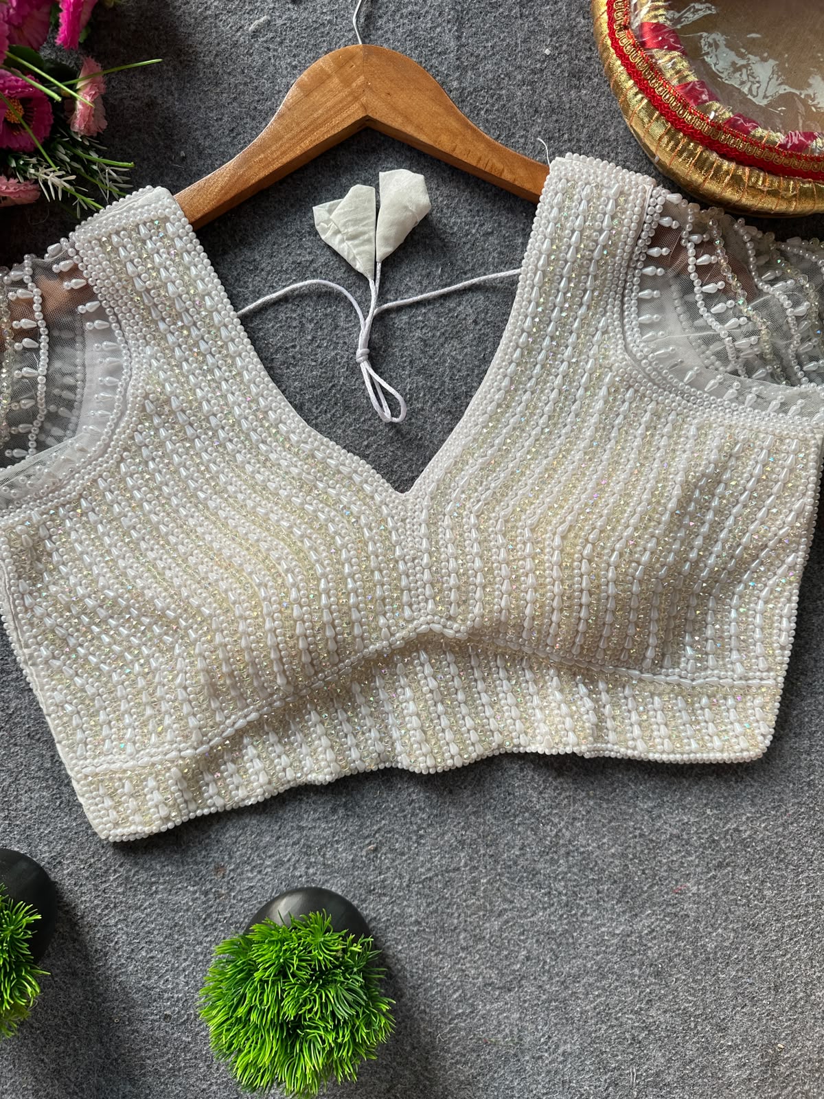 Presenting beautiful handcrafted pearl work in all over ready made blouse