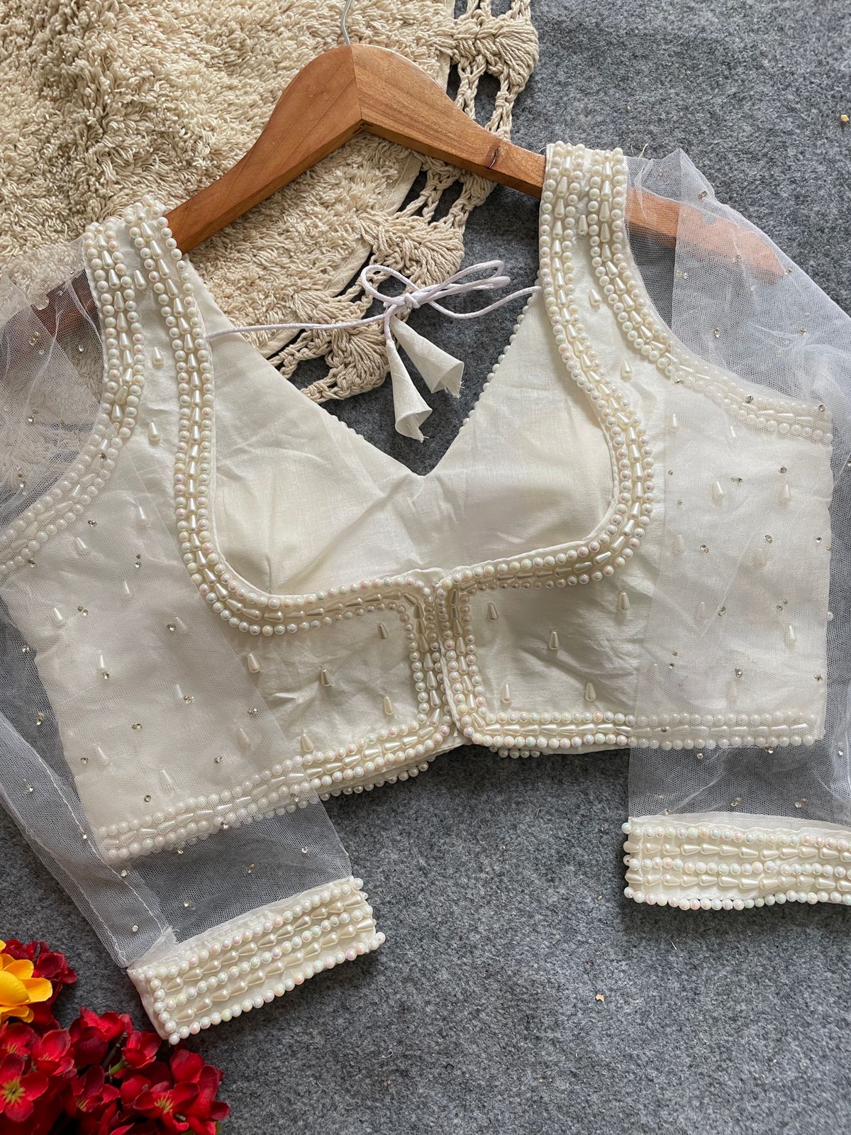 Presenting beautiful handcrafted pearl work ready made blouse