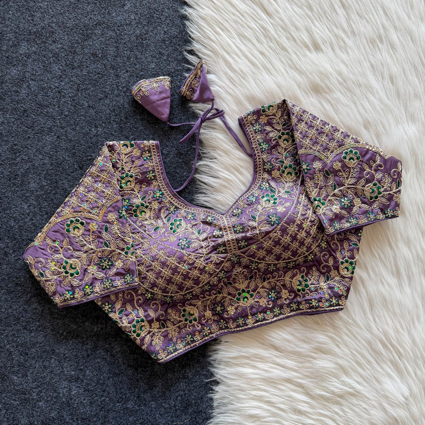 A beautiful  work with  sequins all over ready made blouse