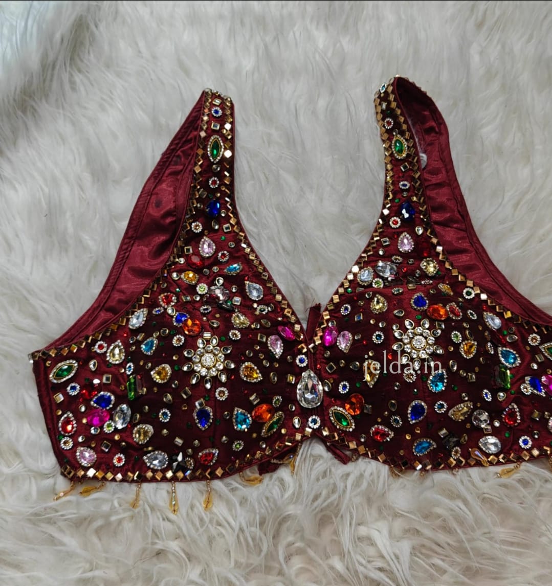 Exclusive jewellary stone work sleeveless custom made blouse