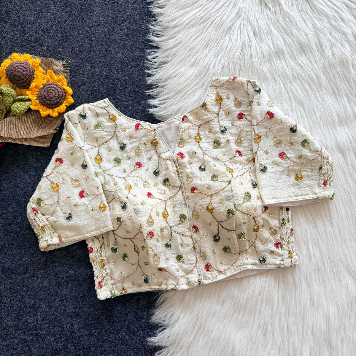 Beautiful embroidery work with elastic attach for better fitting ready made blouse