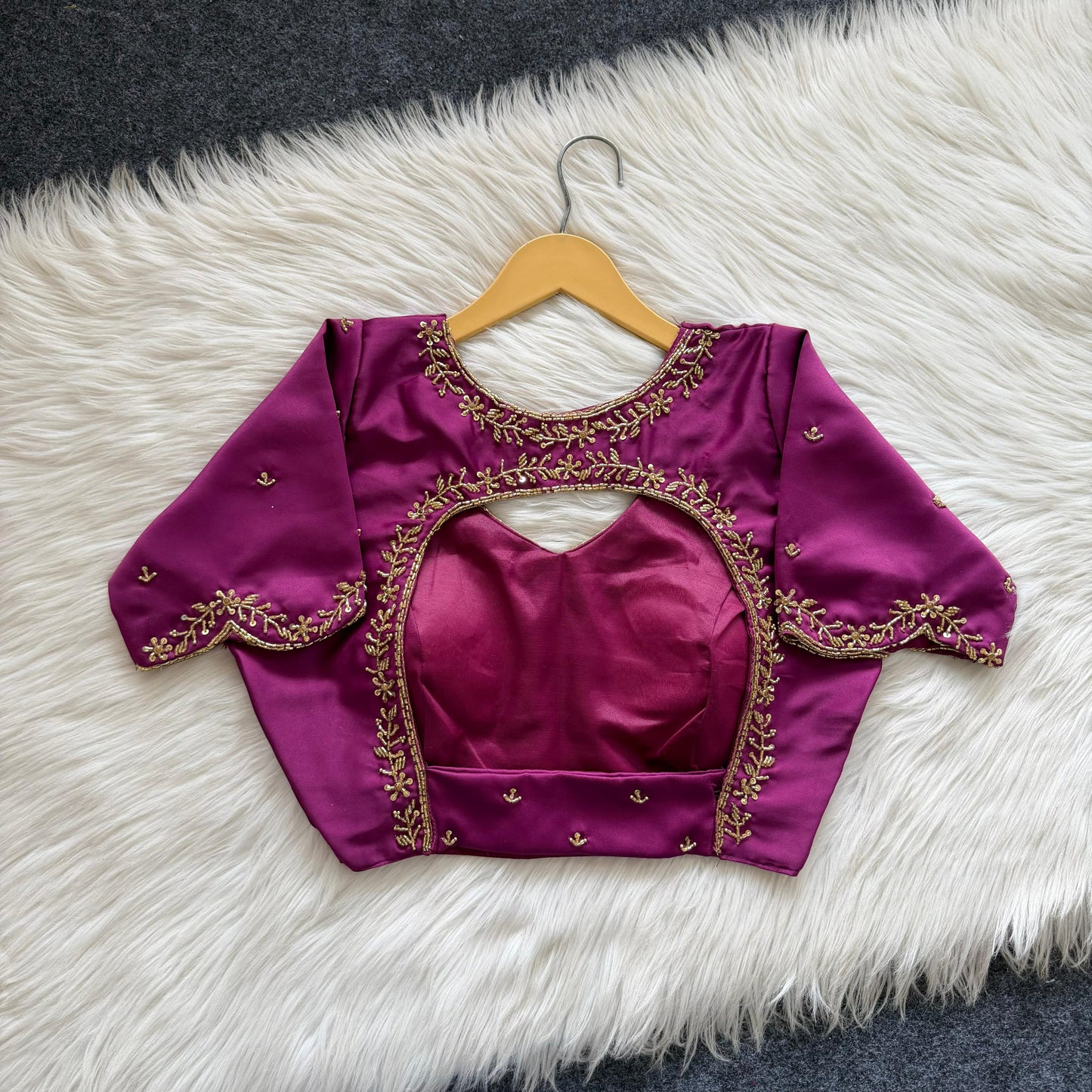 Beautiful handcrafted work in sleeves and back all over ready made blouse